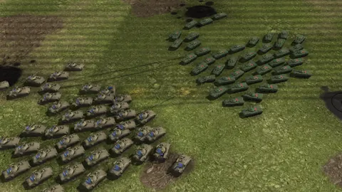In-game screenshot: a column of M2A3 Bradleys opening fire on a formation of BMP-3s across Iron Valley